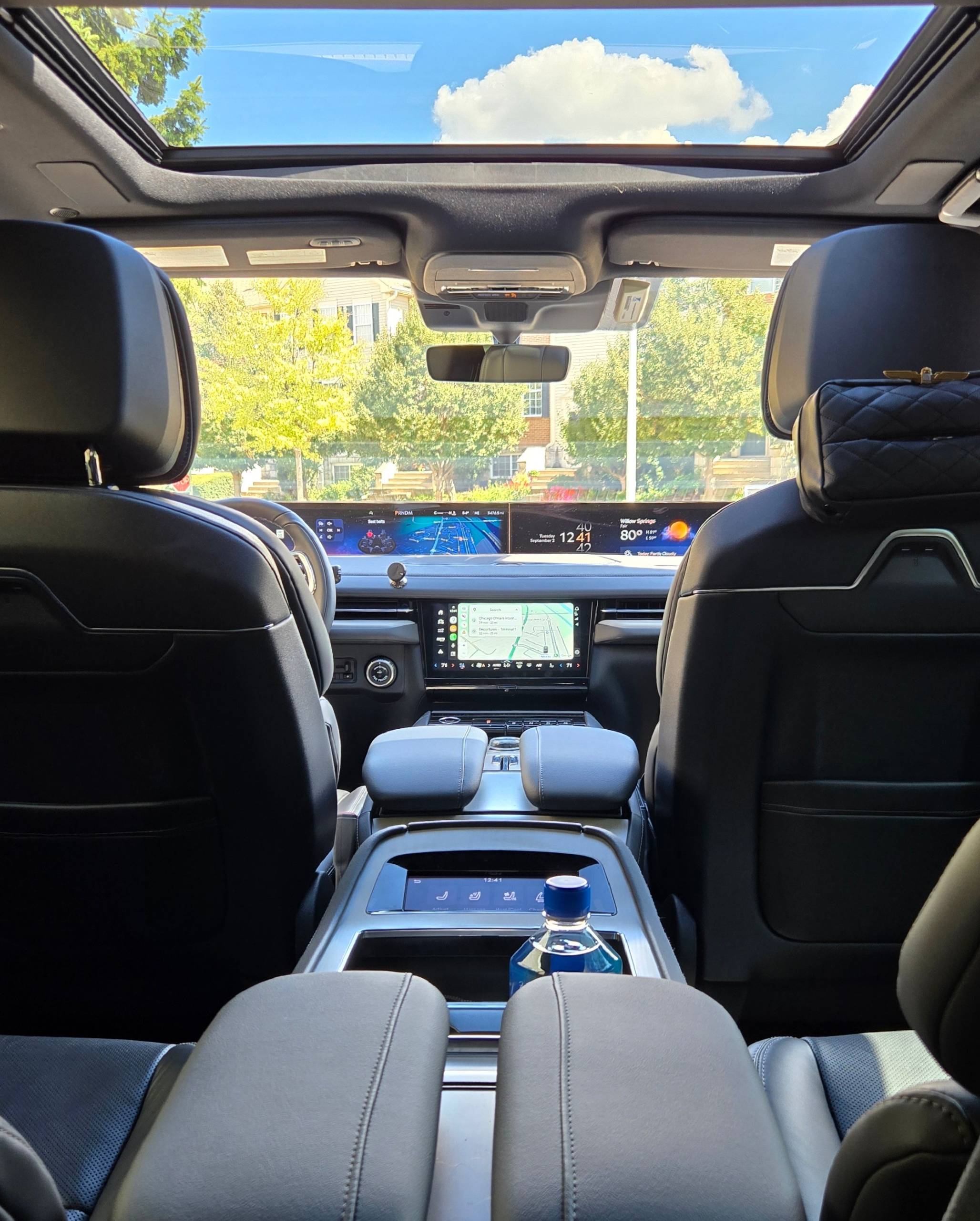 Lincoln Navigator 2025 Jet Appearance luxury SUV interior with captain’s chairs and premium leather – Eagle Black Limo Chicago.