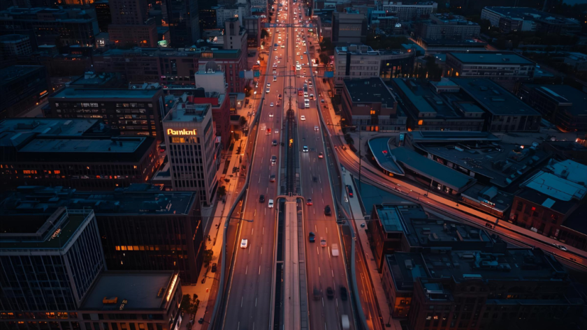 Aerial view of traffic on the Expressway with multiple lanes and cars in motion.