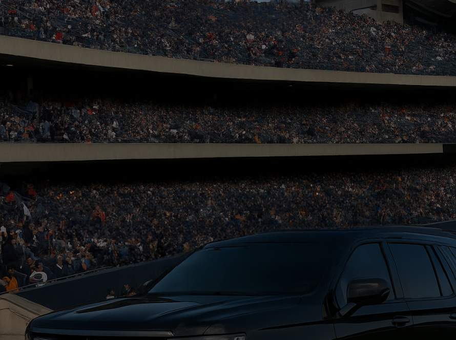 Sporting event chauffeur in Chicago with black SUV parked near stadium entrance